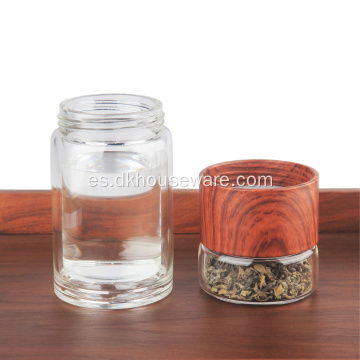 Botella de agua de pared de vidrio doble de borosilicato con colador